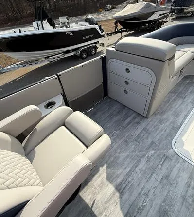 Slide: The Image of 2025 Crest Caribbean 230 boat interior with luxurious seating and modern design. - 5