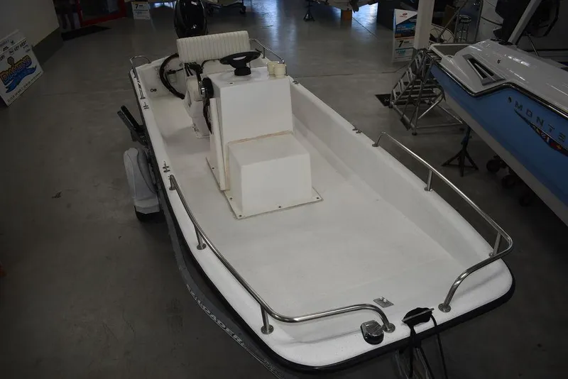 Slide: The Image of 2011 Carolina Skiff J16 boat, white deck, indoor showroom display. - 8