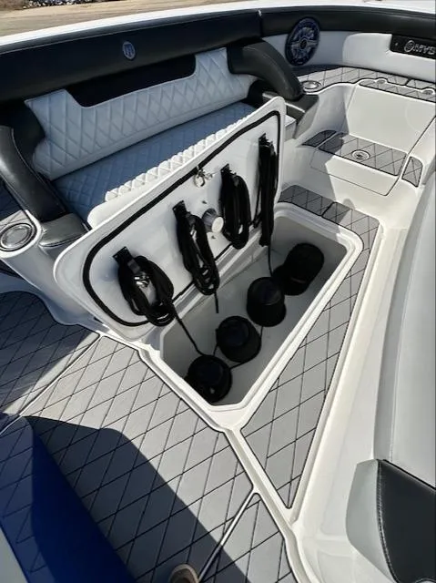 Slide: The Image of 2019 Mystic Powerboats M4200 interior storage compartment with ropes and accessories. - 14