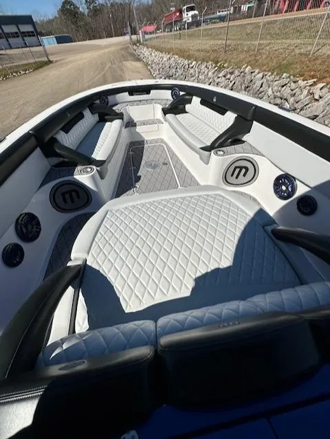 Slide: The Image of 2019 Mystic Powerboats M4200 interior with quilted seating and modern design. - 16