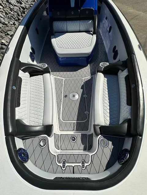 Slide: The Image of 2019 Mystic Powerboats M4200 interior with luxurious seating and sleek design. - 17