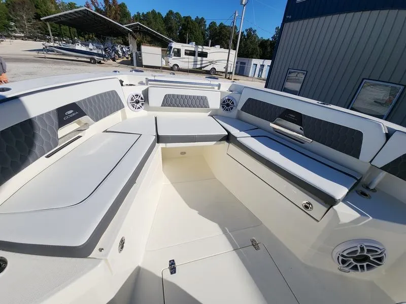 Slide: The Image of 2025 Cobia 265 Center Console boat interior with spacious seating and modern design. - 30