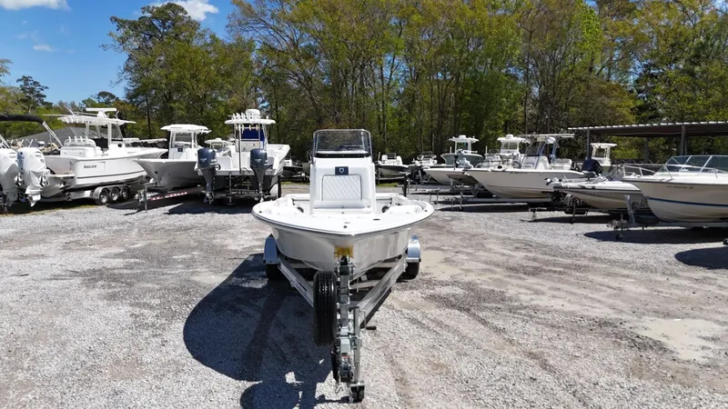 Slide: The Image of 2025 Sea Fox 231 Bay Fox boat on trailer in outdoor lot. - 1