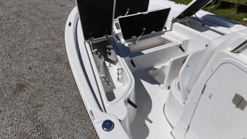 Slide: The Image of 2025 Sea Fox 231 Bay Fox boat interior with open storage compartments. - 10