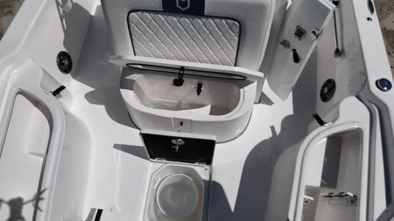 Slide: The Image of 2025 Sea Fox 231 Bay Fox boat interior with storage compartments and seating. - 15