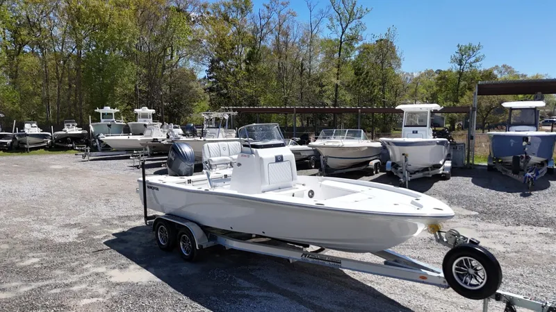 Slide: The Image of 2025 Sea Fox 231 Bay Fox boat on trailer in outdoor lot. - 2