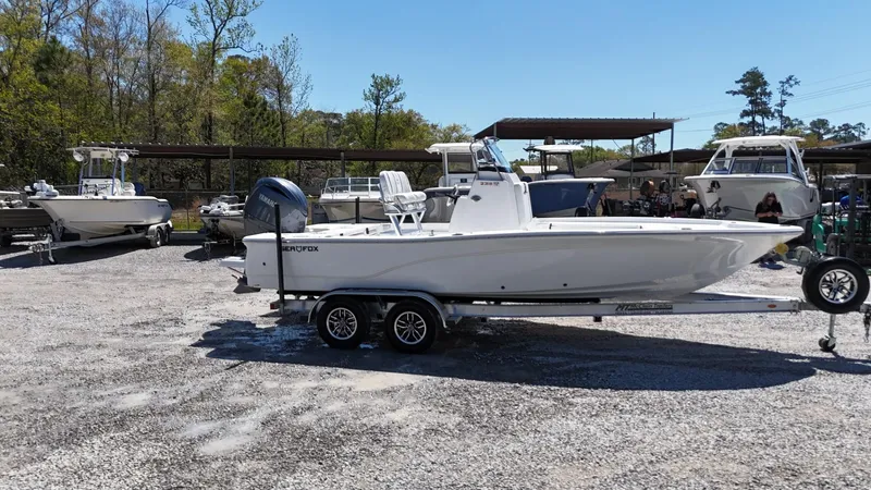 Slide: The Image of 2025 Sea Fox 231 Bay Fox boat on trailer in outdoor lot. - 3