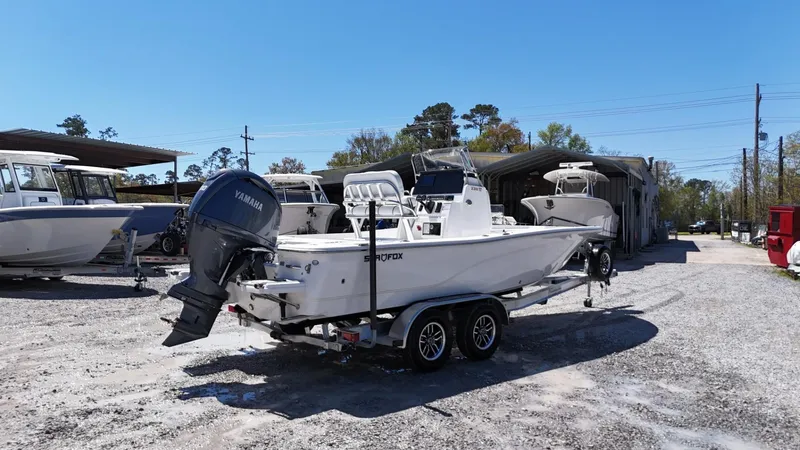 Slide: The Image of 2025 Sea Fox 231 Bay Fox boat on trailer in outdoor storage area. - 4