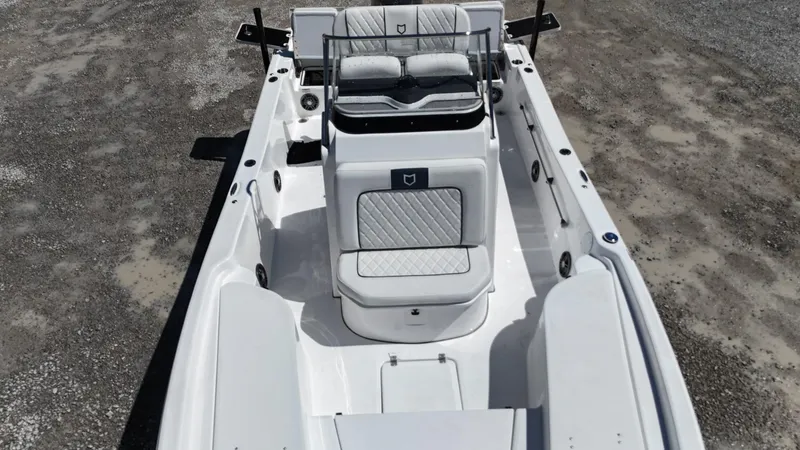 Slide: The Image of 2025 Sea Fox 231 Bay Fox boat interior, featuring sleek white seating and modern design. - 8