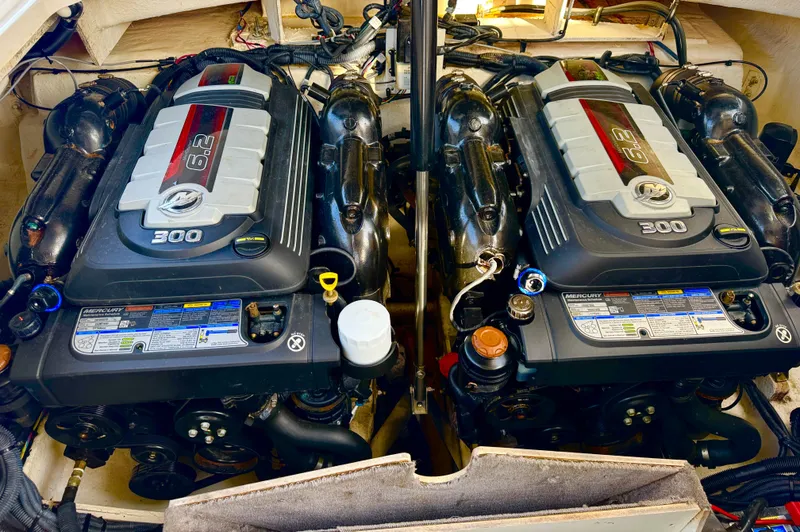 Slide: The Image of Twin engines of a 2019 Sea Ray SLX 310 boat, showcasing powerful performance. - 43