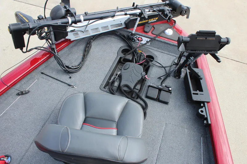 Slide: The Image of 2022 Tracker Pro Team 175 TXW boat interior with fishing equipment and seating. - 28