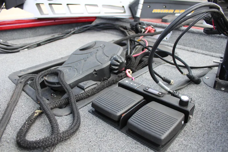 Slide: The Image of 2022 Tracker Pro Team 175 TXW boat deck with foot pedals and control cables. - 30