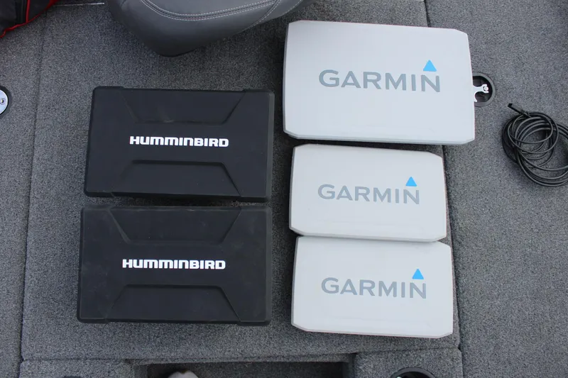 Slide: The Image of Fishfinder covers on a 2022 Tracker Pro Team 175 TXW boat deck. - 35