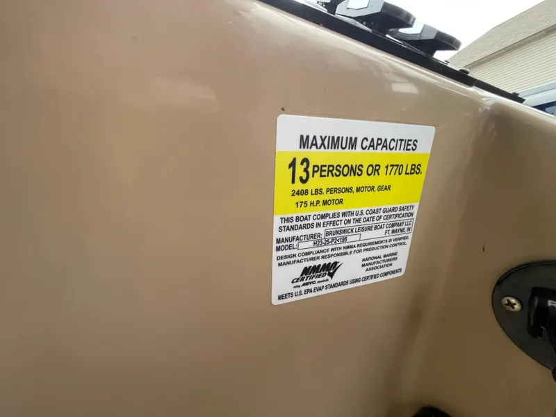 Slide: The Image of 2023 Harris Cruiser 230 capacity label: 13 persons or 1770 lbs, 175 HP motor. - 25