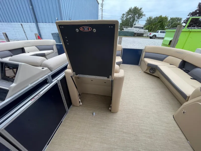 Slide: The Image of 2023 Harris Cruiser 230 interior with beige seating and spacious layout. - 31