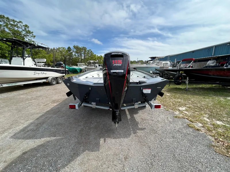 Slide: The Image of 2025 Crestliner 1800 Bay boat with Mercury 115 Pro XS engine, parked outdoors. - 3