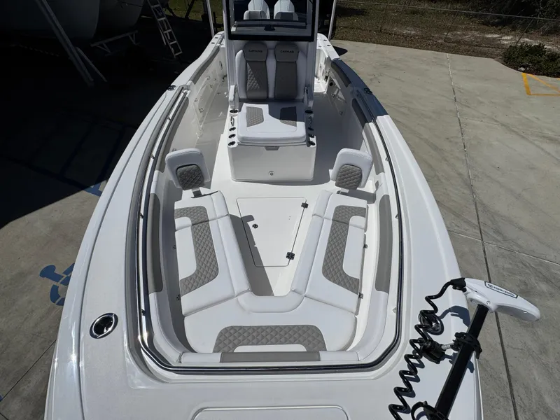 Slide: The Image of 2025 Caymas 291 boat interior with spacious seating and modern design. - 22