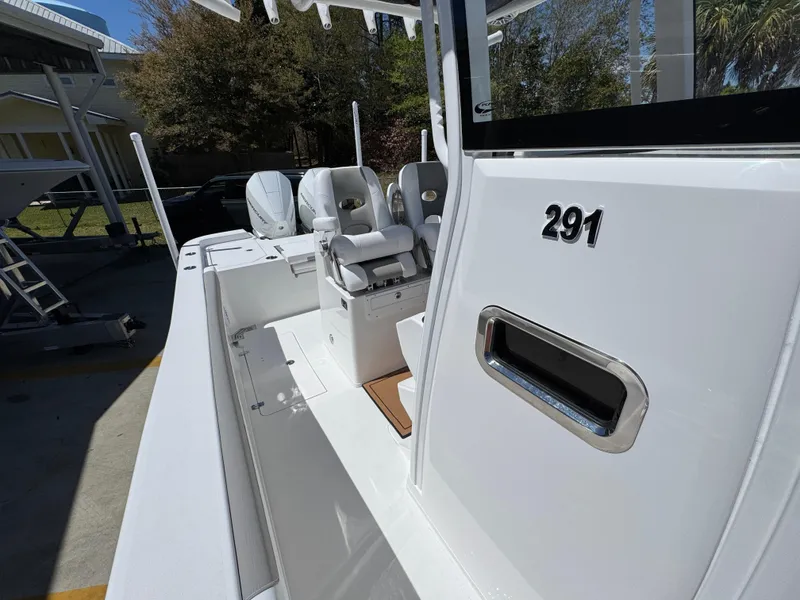 Slide: The Image of 2025 Caymas 291 boat interior with seating and sleek design. - 27