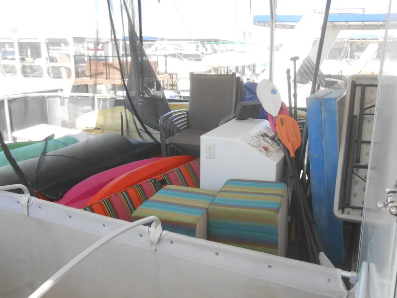 Slide: The Image of 2008 Sumerset 7518 houseboat deck with colorful outdoor furniture and equipment. - 30
