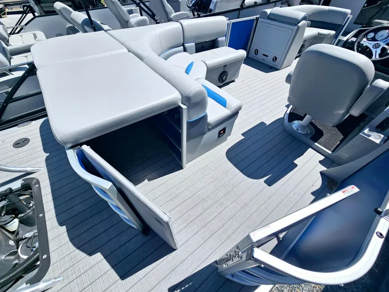 Slide: The Image of 2025 Bentley Pontoons Legacy Cruise 223 interior with seating and storage compartments. - 16