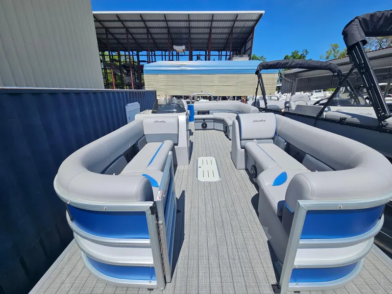 Slide: The Image of 2025 Bentley Pontoons Legacy Cruise 223 with spacious seating and modern design. - 9