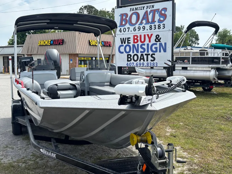 Slide: The Image of 2019 SeaArk Big Easy boat displayed at a dealership with consignment services. - 3