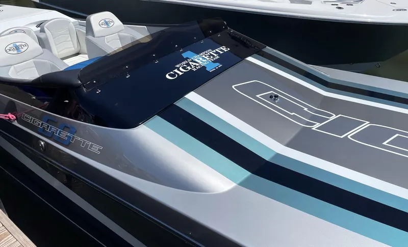 Slide: The Image of 2011 Cigarette 50 boat with sleek design and branded seating. - 2
