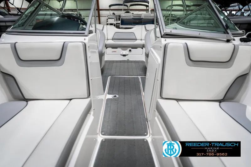 Slide: The Image of 2018 Yamaha Boats SX190 interior with sleek seating and modern design. - 19
