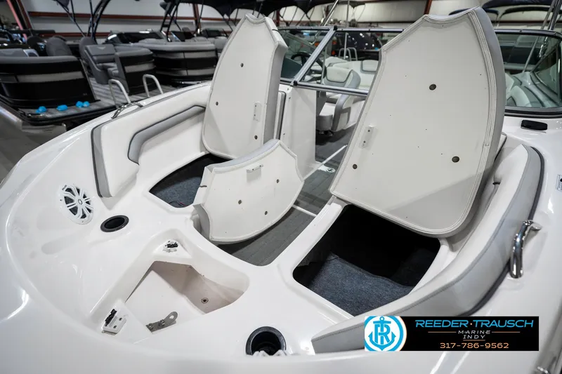 Slide: The Image of 2018 Yamaha SX190 boat interior with open storage compartments. - 23
