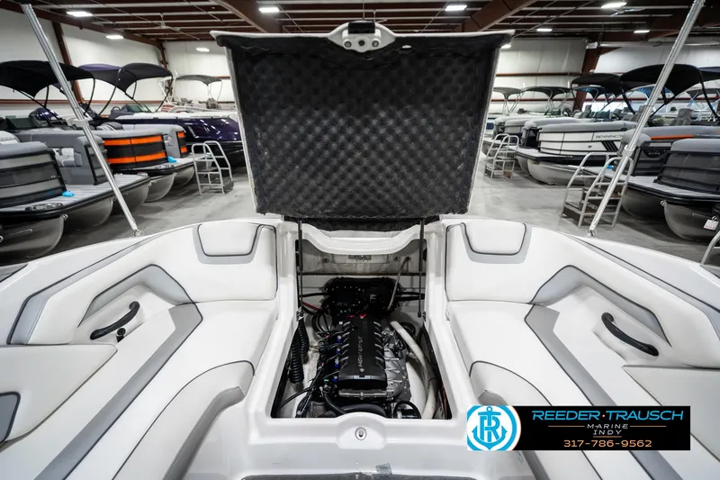 Slide: The Image of 2018 Yamaha SX190 boat engine compartment open in showroom. - 31