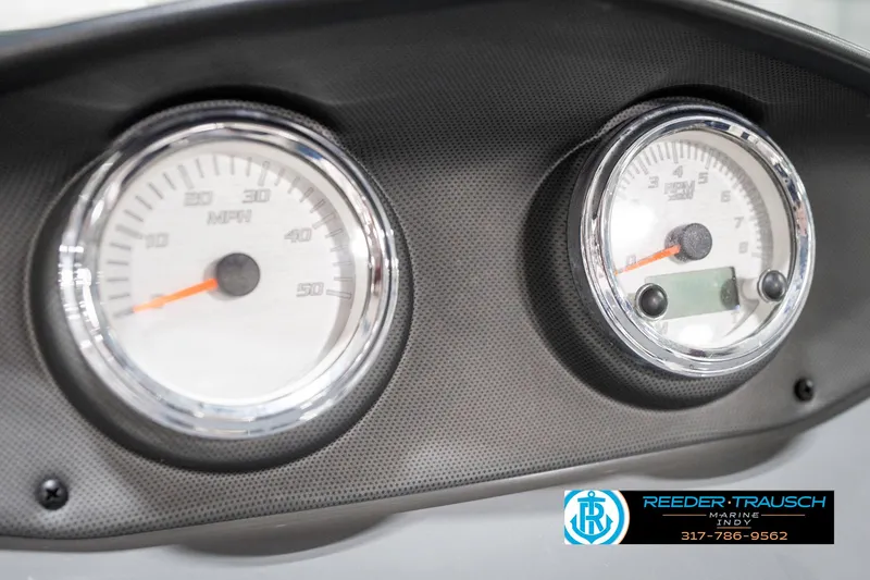 Slide: The Image of Dashboard of 2018 Yamaha Boats SX190 with speedometer and tachometer gauges. - 36