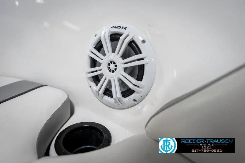 Slide: The Image of 2018 Yamaha SX190 boat interior with Kicker speaker and cup holder. - 40