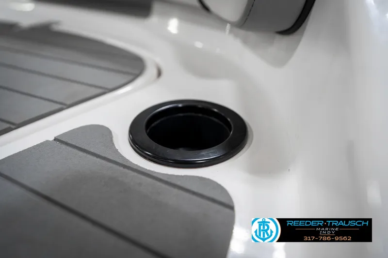 Slide: The Image of Cup holder on 2018 Yamaha SX190 boat deck, featuring gray and white design. - 44