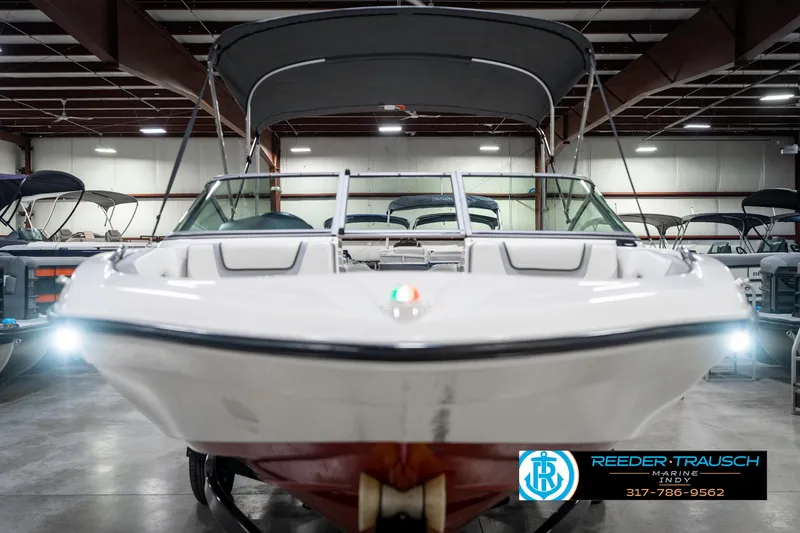 Slide: The Image of 2018 Yamaha SX190 boat in showroom, front view with canopy. - 5