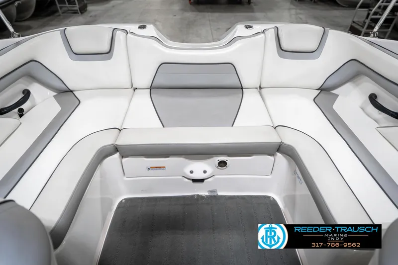 Slide: The Image of 2018 Yamaha SX190 boat interior with white and gray seating. - 28