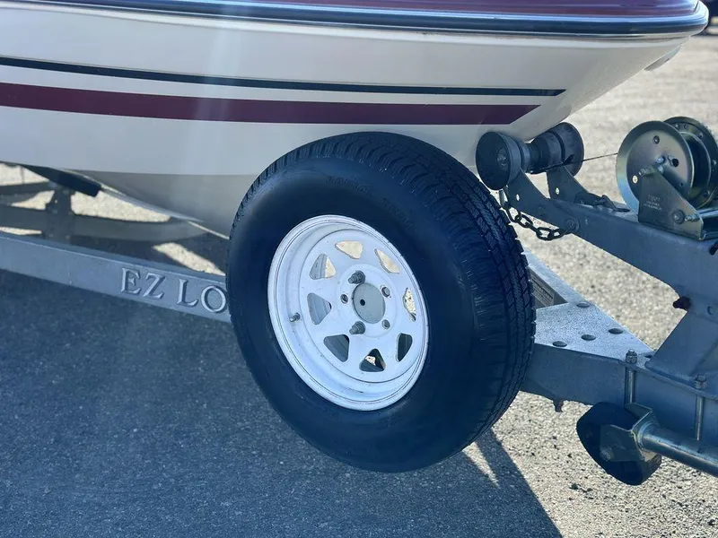 Slide: The Image of Trailer wheel of 2007 Glastron GT 185 boat on EZ Loader trailer. - 4