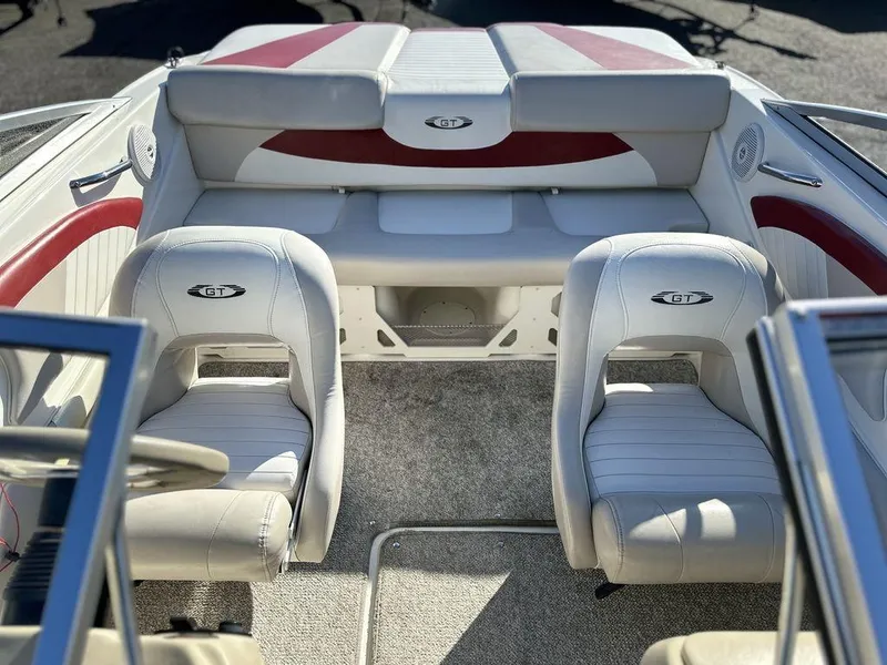 Slide: The Image of 2007 Glastron GT 185 boat interior with white and red seating. - 5