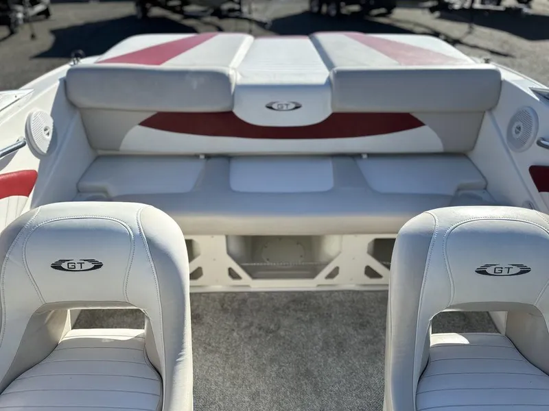 Slide: The Image of 2007 Glastron GT 185 boat interior with white and red seating. - 8