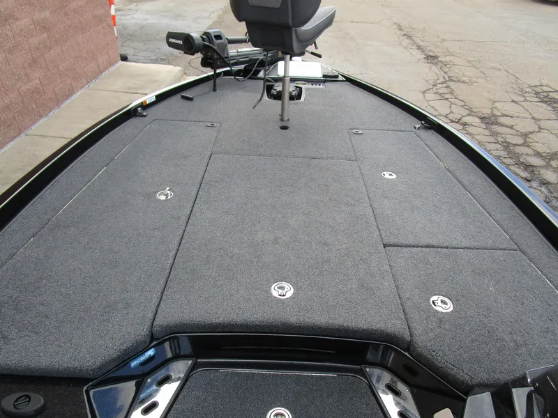 Slide: The Image of 2024 Ranger Z521 Ranger Cup boat deck with seating and storage compartments. - 10