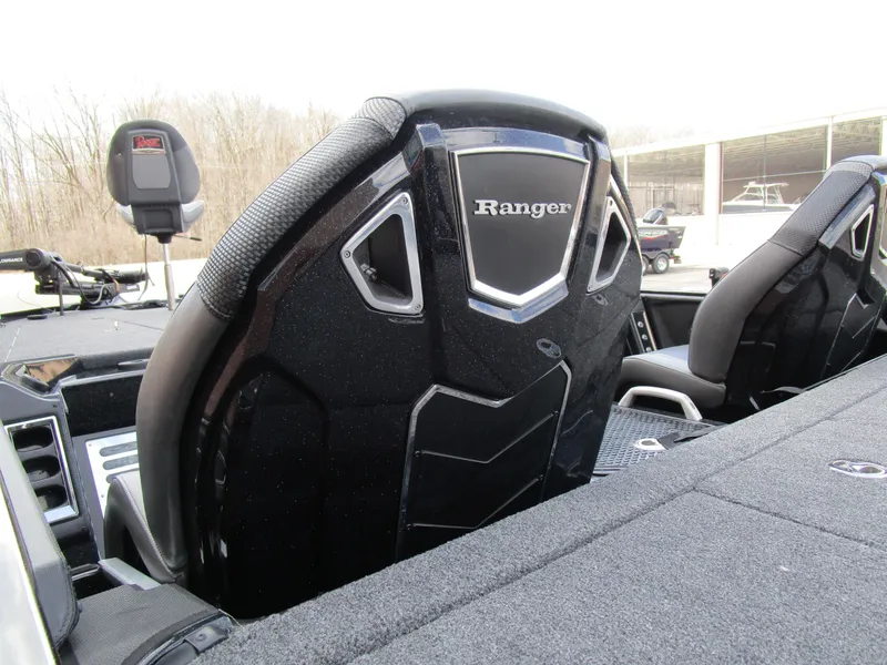 Slide: The Image of 2024 Ranger Z521 Ranger Cup boat seats with sleek black design and modern dashboard. - 5