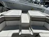 Slide: The Image of 2013 Sea Ray 270 SLX boat interior with spacious seating and sleek design. - 14