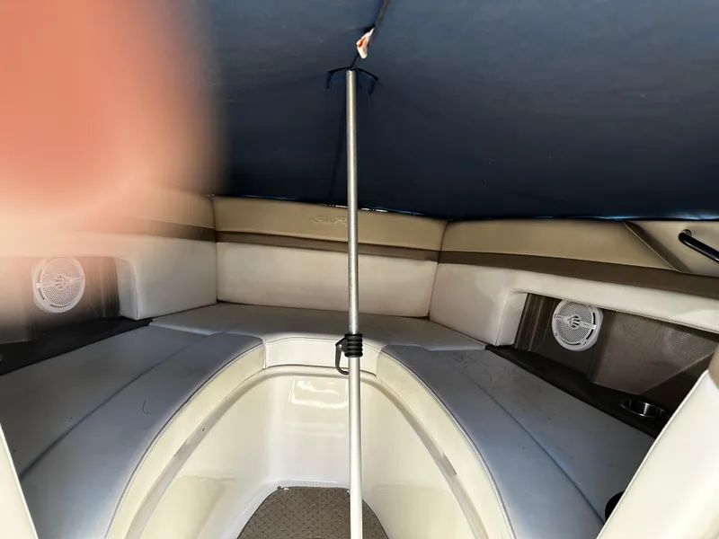 Slide: The Image of Interior of 2013 Sea Ray 270 SLX boat with seating and canopy. - 18