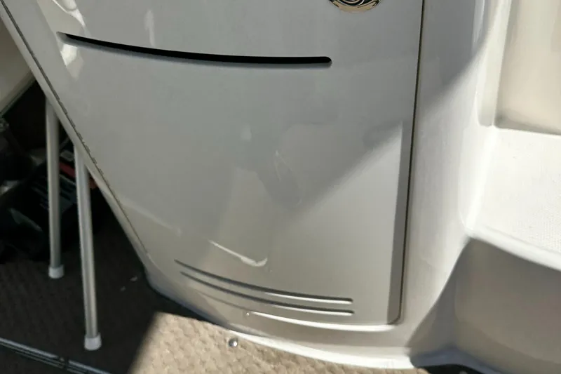 Slide: The Image of 2013 Sea Ray 270 SLX boat interior detail with sleek design and modern finish. - 23