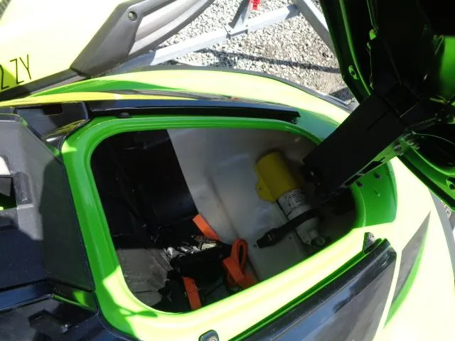 Slide: The Image of 2021 Yamaha WaveRunner VX Cruiser HO storage compartment, open with visible safety equipment. - 11