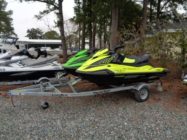 Slide: The Image of 2021 Yamaha WaveRunner VX Cruiser HO on trailer, parked outdoors among trees. - 8