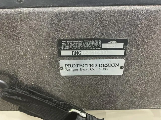 Slide: The Image of 2009 Ranger Reata 186 boat identification plate with patent information and protected design label. - 15