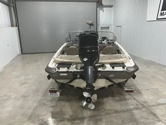 Slide: The Image of 2009 Ranger Reata 186 boat in storage, rear view with motor and propeller visible. - 3