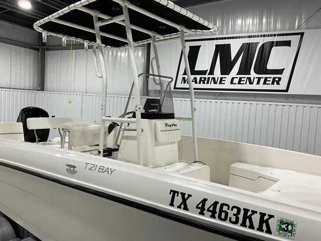 Slide: The Image of Bayliner T21BAY 2021 boat at LMC Marine Center, featuring registration TX 4463 KK. - 9