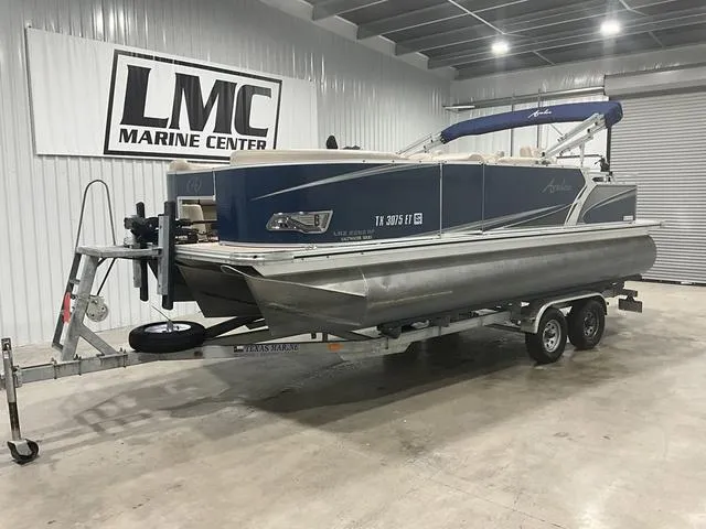 Slide: The Image of 2019 Avalon 22 LSZ pontoon boat on trailer at LMC Marine Center. - 1
