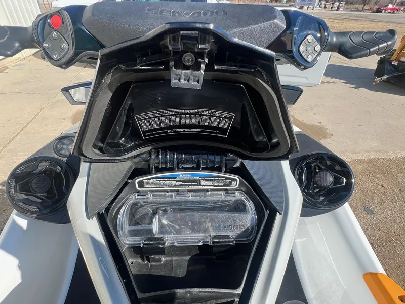 Slide: The Image of 2019 Sea-Doo Fish Pro 155 dashboard with open storage compartment. - 11